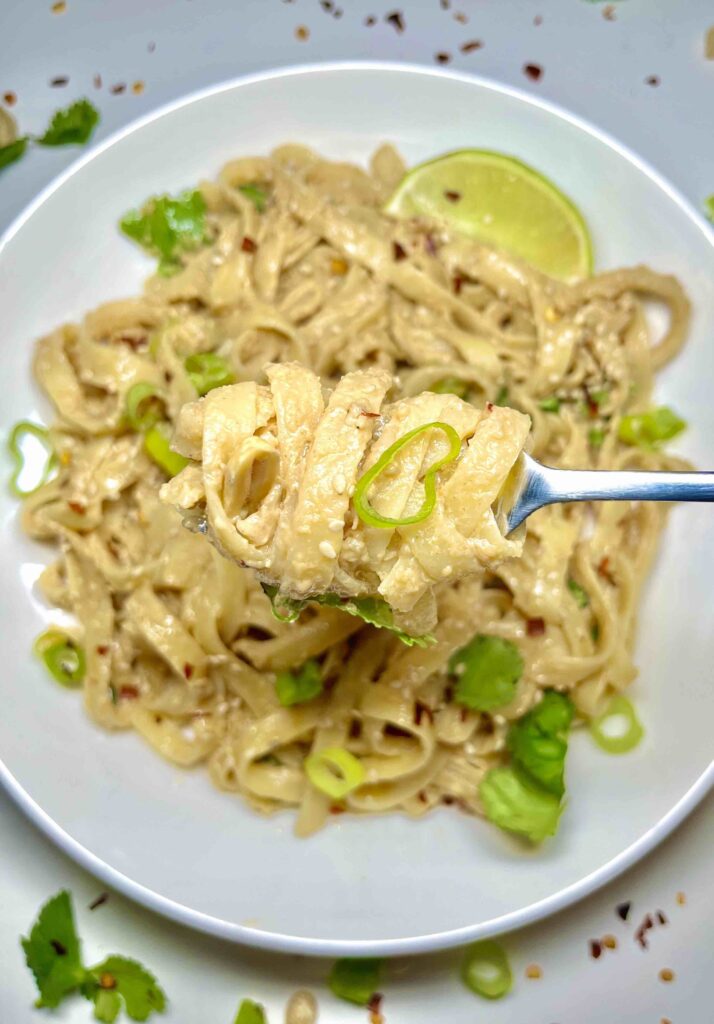 close-up of noodles with peanut sauce