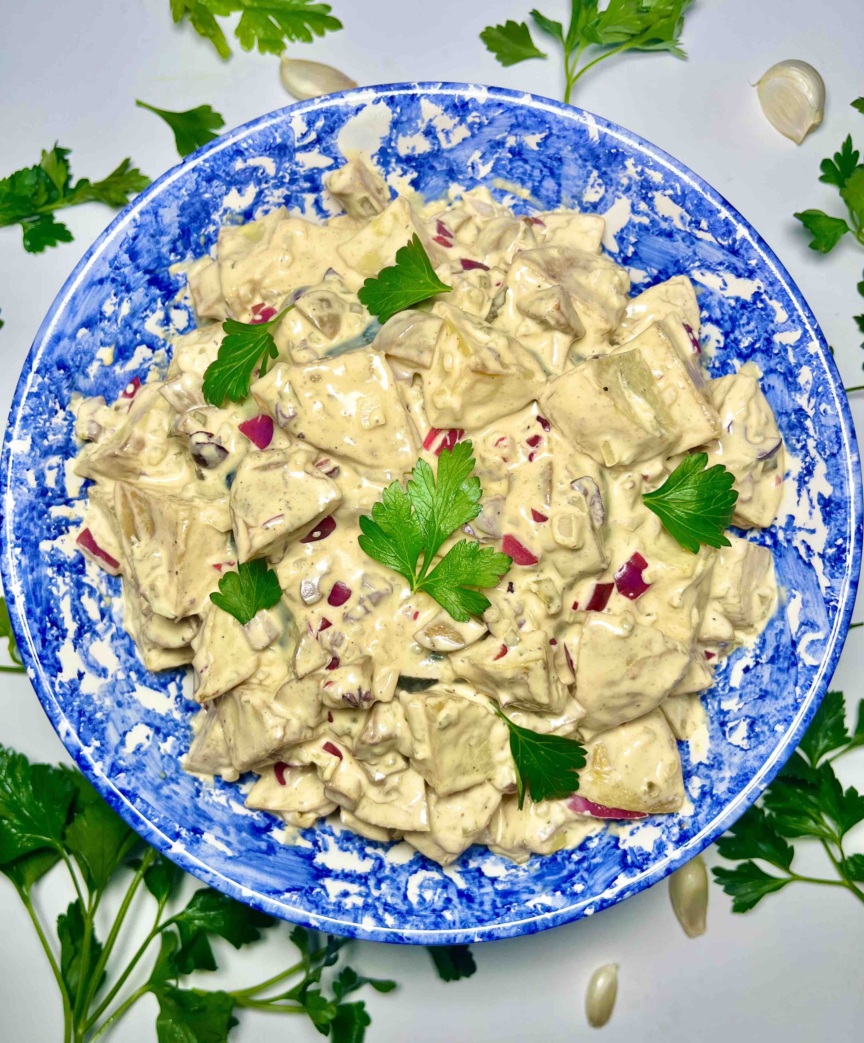 cuban potato salad in a blue bowl