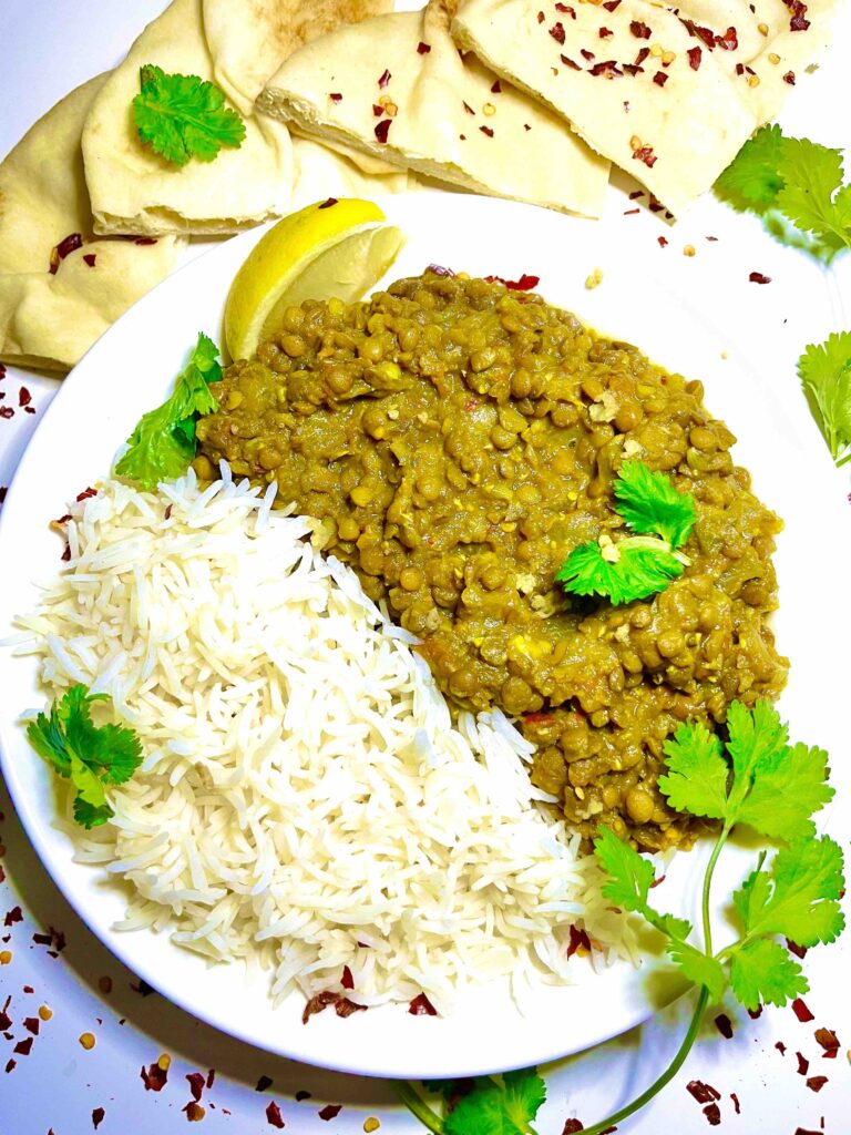 spiced brown lentils on plate with rice