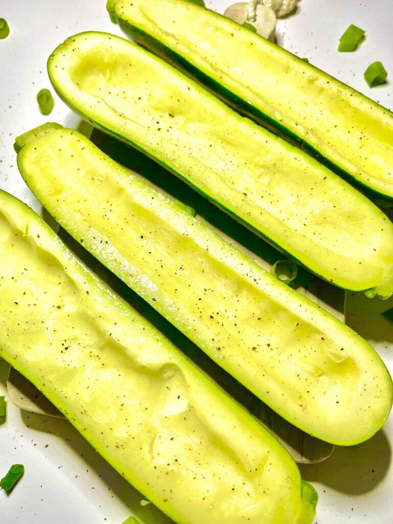 sliced and seasoned zucchini on plate