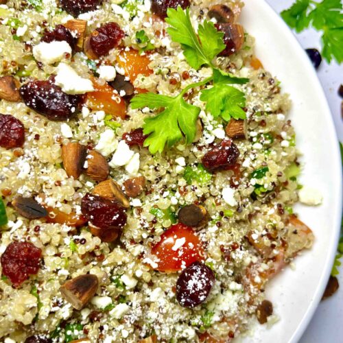 quinoa salad with maple dijon vinaigrette on a plate seen from above
