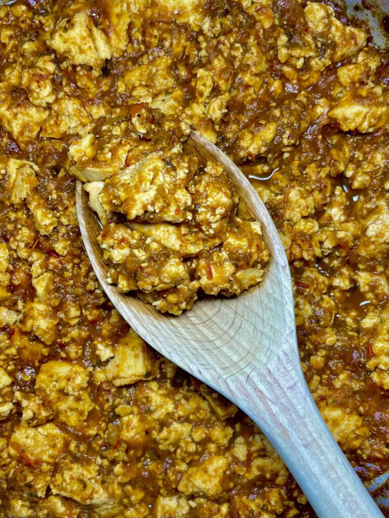 sofritas tofu seen in close up with spoon