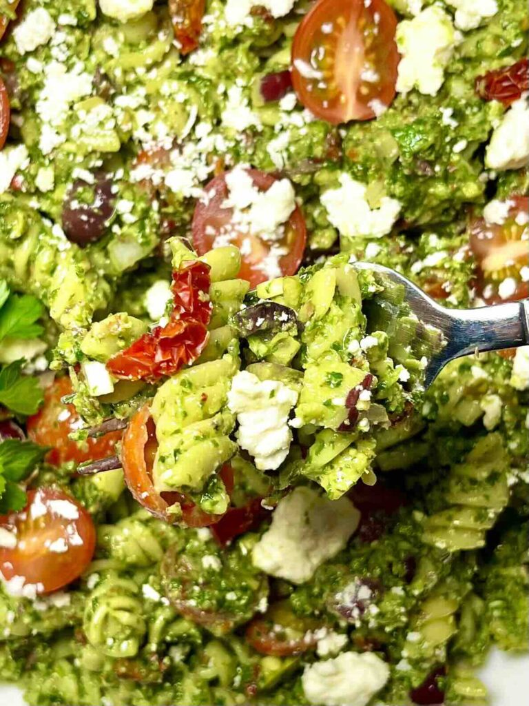 close-up of parsley pesto pasta salad